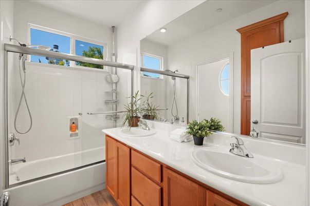Bathroom, Dual Sink Vanities, Glass Shower, Interior, Recessed Lighting, Wood Texture Flooring