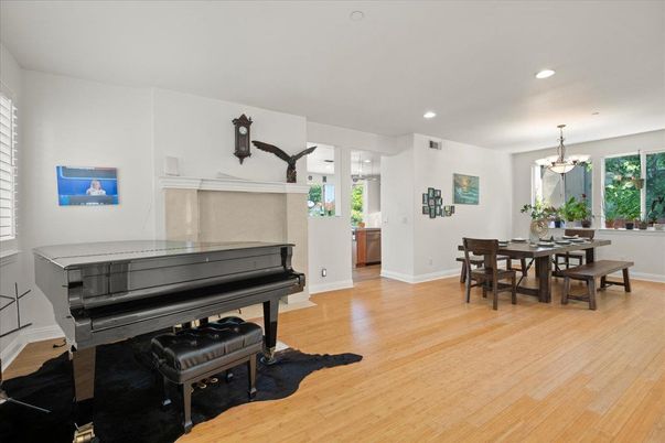 Chandelier, Dining room, Interior, Piano, Recessed Lighting, Wood Texture Flooring