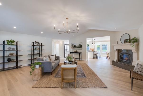 Chandelier, Dining room, Fireplace, Interior, Living room, Pendant Lights, Recessed Lighting, Wood Texture Flooring