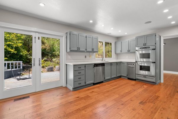 Interior, Kitchen, Recessed Lighting, Stainless Steel Appliances, Wood Texture Flooring