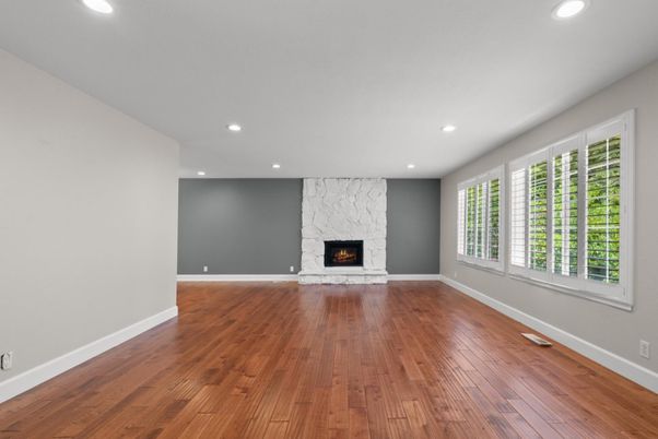Empty room, Fireplace, Interior, Recessed Lighting, Wood Texture Flooring