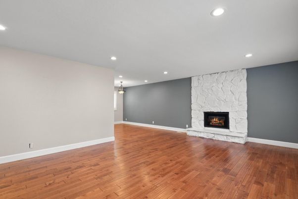Empty room, Fireplace, Interior, Recessed Lighting, Wood Texture Flooring