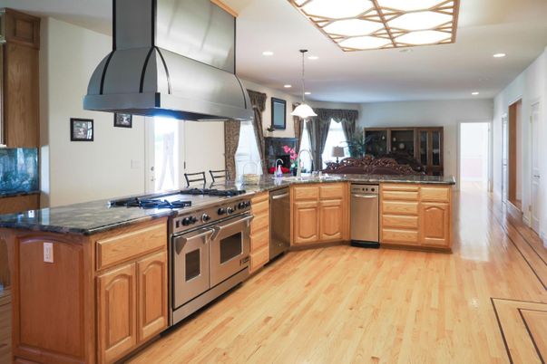 Interior, Kitchen, Pendant Lights, Recessed Lighting, Stainless Steel Appliances, Wood Texture Flooring