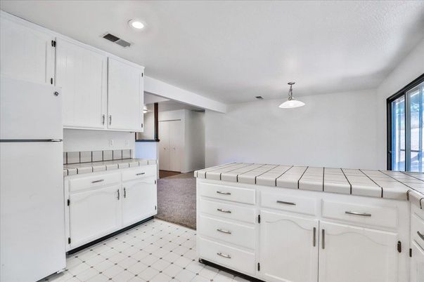 Interior, Kitchen, Recessed Lighting, Tile Countertops
