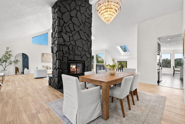 Chandelier, Dining room, Fireplace, Interior, Living room, Recessed Lighting, Stone Walls, Wood Texture Flooring
