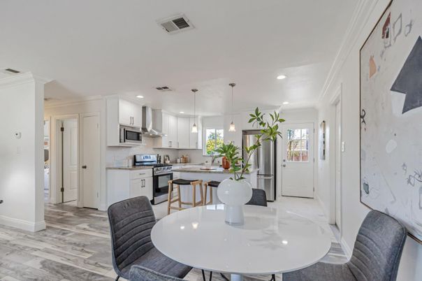 Dining room, Interior, Kitchen, Pendant Lights, Recessed Lighting, Stainless Steel Appliances, Wood Texture Flooring