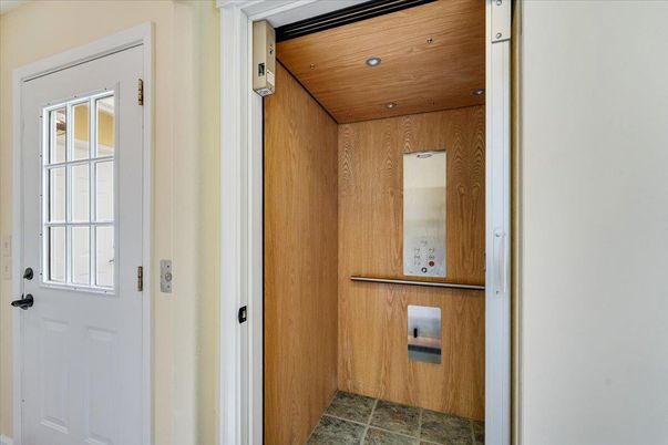 Elevator, Interior, Recessed Lighting, Wooden Ceilings, Wooden Walls