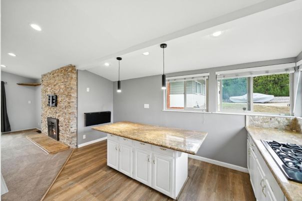 Fireplace, Interior, Kitchen, Pendant Lights, Recessed Lighting, Stone Walls, Wood Texture Flooring