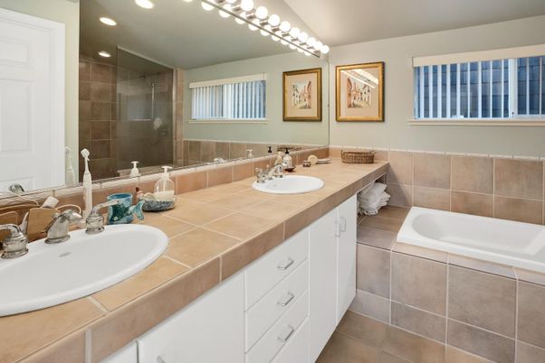 Bathroom, Dual Sink Vanities, Glass Shower, Interior, Recessed Lighting, Tile Countertops