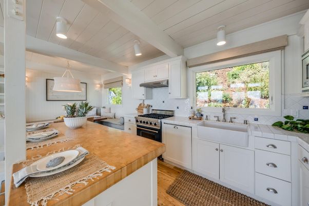 Interior, Kitchen, Pendant Lights, Recessed Lighting, Tile Countertops, Wood Texture Flooring