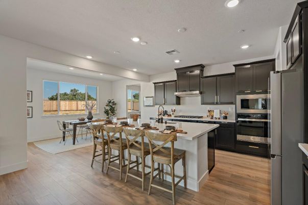 Dining room, Interior, Kitchen, Recessed Lighting, Stainless Steel Appliances, Wood Texture Flooring