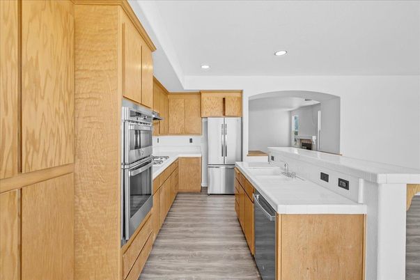 Interior, Kitchen, Recessed Lighting, Stainless Steel Appliances, Wood Texture Flooring