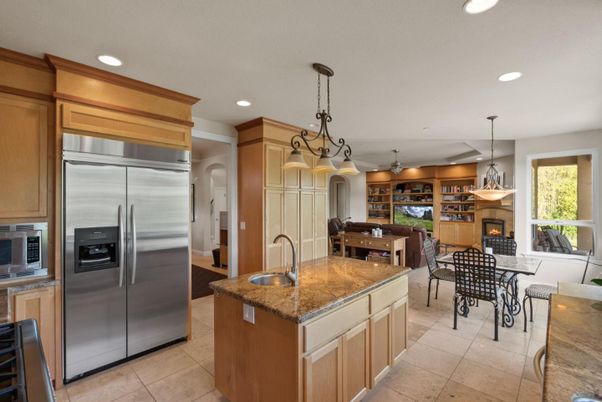 Chandelier, Dining room, Fireplace, Interior, Kitchen, Pendant Lights, Recessed Lighting, Stainless Steel Appliances