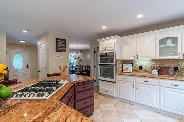 Chandelier, Dining room, Interior, Kitchen, Recessed Lighting, Stainless Steel Appliances