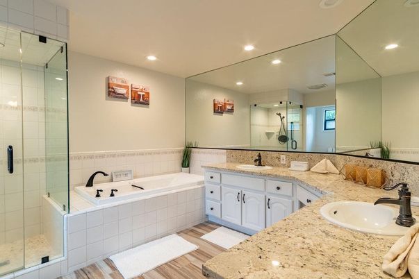Bathroom, Dual Sink Vanities, Glass Shower, Interior, Recessed Lighting, Wood Texture Flooring
