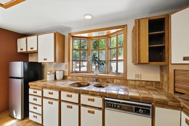 Interior, Kitchen, Recessed Lighting, Tile Countertops, Wood Texture Flooring