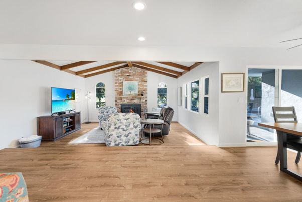 Fireplace, Interior, Living room, Recessed Lighting, Stone Walls, Wooden Beams, Wood Texture Flooring