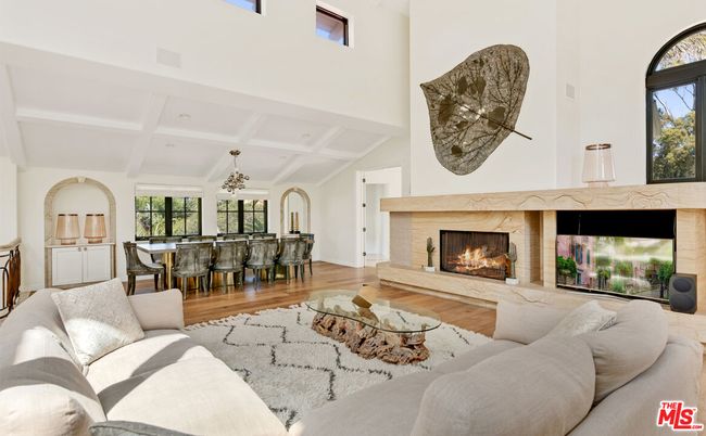 Chandelier, Dining room, Fireplace, Interior, Living room, Piano, Recessed Lighting, Wood Texture Flooring
