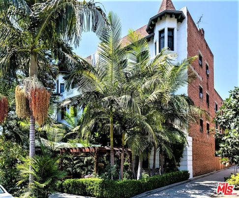 Exterior, Facade, Brick Facade, Condo Building