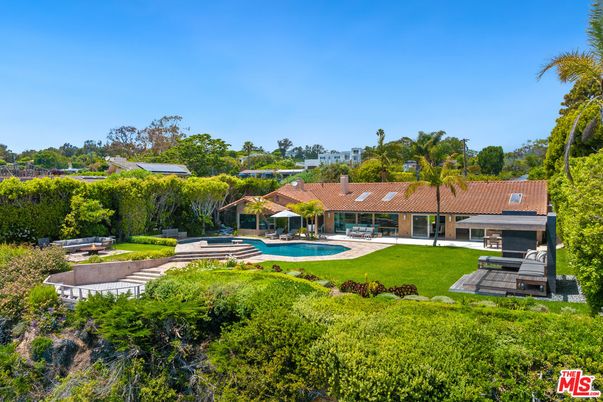 Exterior, Pool, Solar Panels