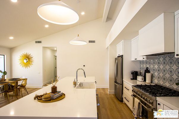 Dining room, Interior, Kitchen, Pendant Lights, Recessed Lighting, Stainless Steel Appliances, Wood Texture Flooring