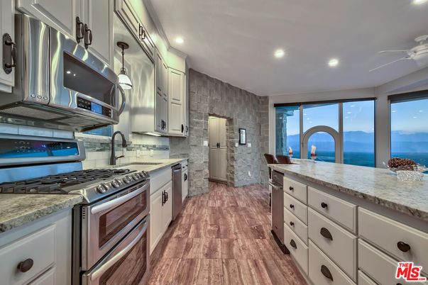 Interior, Kitchen, Recessed Lighting, Stainless Steel Appliances, Water, Wood Texture Flooring