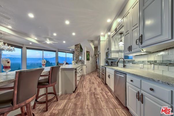 Interior, Kitchen, Recessed Lighting, Stainless Steel Appliances, Water, Wood Texture Flooring