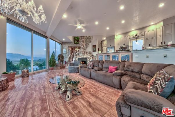 Fireplace, Interior, Kitchen, Living room, Recessed Lighting, Stone Walls, Wood Texture Flooring