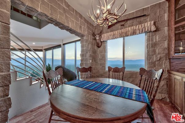 Chandelier, Dining room, Interior, Stone Walls, Water, Wood Texture Flooring