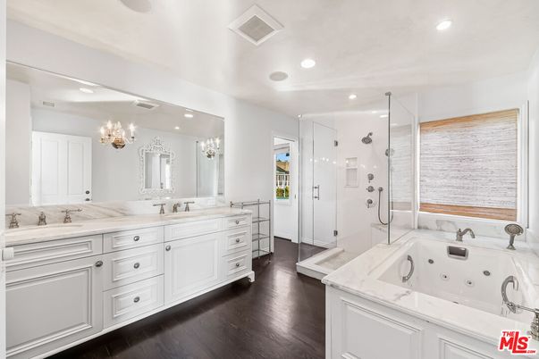 Bathroom, Dual Sink Vanities, Glass Shower, Interior, Recessed Lighting, Wood Texture Flooring