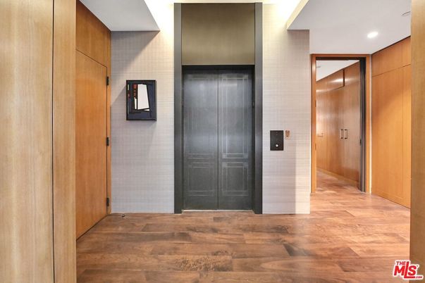 Elevator, Interior, Recessed Lighting, Wood Texture Flooring, Wooden Walls