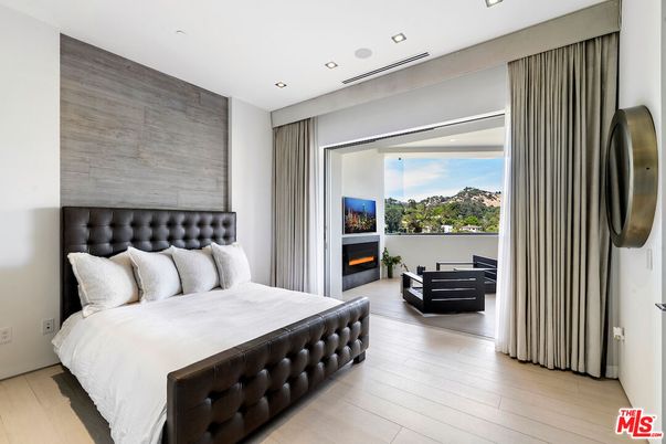 Bedroom, Fireplace, Interior, Recessed Lighting, Wood Texture Flooring