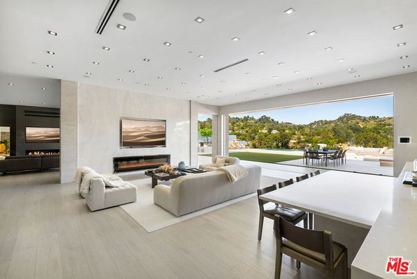 Dining room, Fireplace, Interior, Living room, Recessed Lighting, Wood Texture Flooring