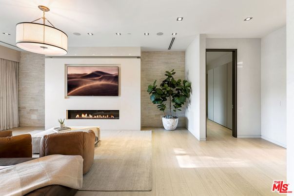 Fireplace, Interior, Living room, Pendant Lights, Recessed Lighting, Stone Walls, Wood Texture Flooring
