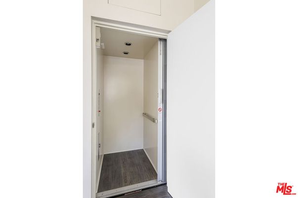 Elevator, Interior, Recessed Lighting, Wood Texture Flooring