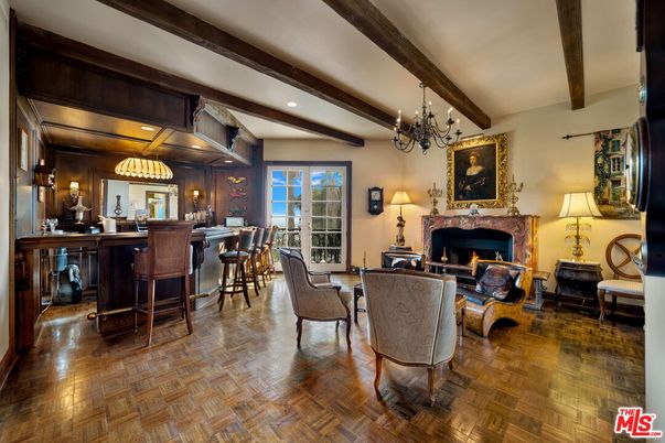 Chandelier, Dining room, Fireplace, Interior, Living room, Recessed Lighting, Wooden Beams, Wood Texture Flooring