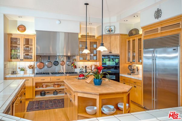 Interior, Kitchen, Pendant Lights, Recessed Lighting, Stainless Steel Appliances, Tile Countertops, Wood Texture Flooring