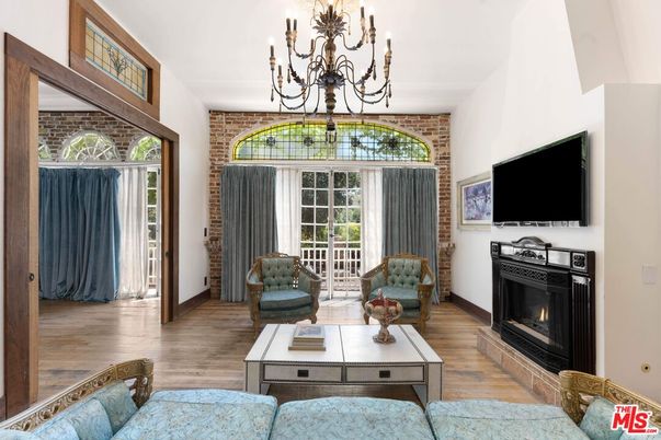 Chandelier, Fireplace, Interior, Living room, Stone Walls, Wood Texture Flooring