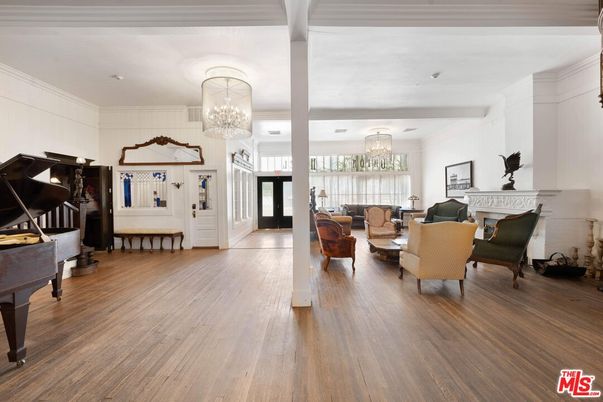 Chandelier, Fireplace, Interior, Living room, Piano, Wood Texture Flooring