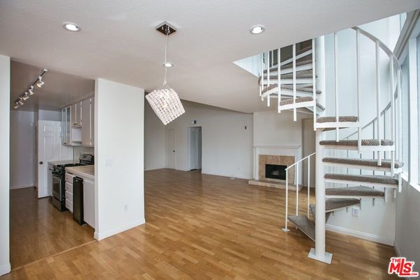 Chandelier, Fireplace, Interior, Kitchen, Recessed Lighting, Wood Texture Flooring