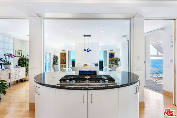 Dining room, Interior, Kitchen, Pendant Lights, Recessed Lighting, Stainless Steel Appliances, Water, Wood Texture Flooring