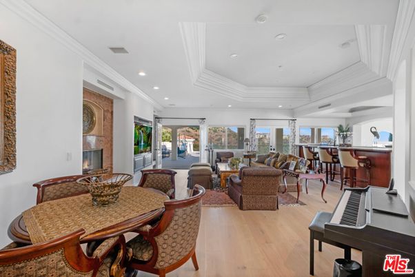 Dining room, Fireplace, Interior, Living room, Piano, Recessed Lighting, Wood Texture Flooring