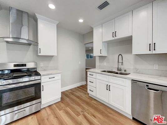 Interior, Kitchen, Recessed Lighting, Stainless Steel Appliances, Wood Texture Flooring