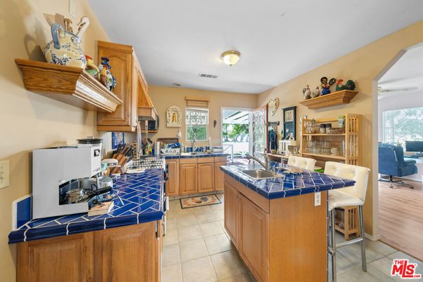Interior, Kitchen, Tile Countertops, Wood Texture Flooring