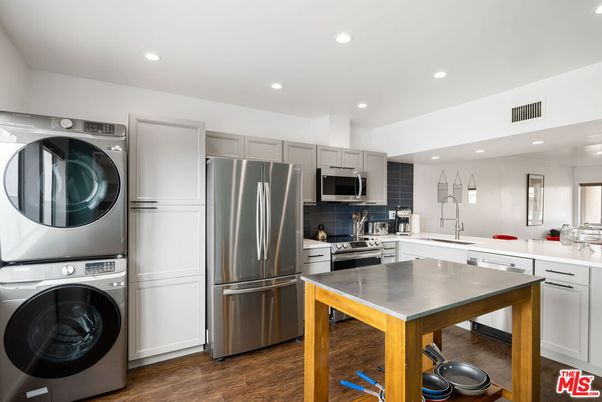 Interior, Kitchen, Recessed Lighting, Stainless Steel Appliances, Washer, Wood Texture Flooring