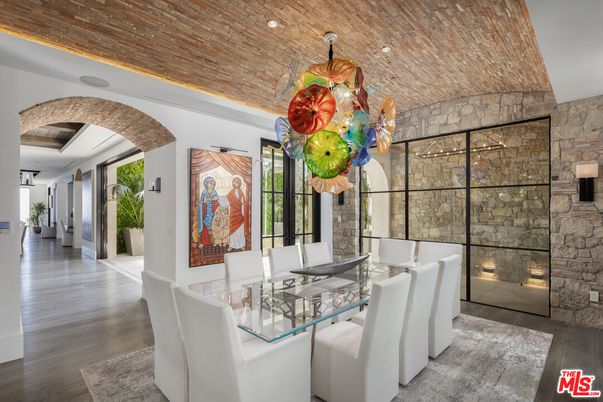 Dining room, Fireplace, Interior, Recessed Lighting, Stone Walls, Wooden Ceilings, Wood Texture Flooring