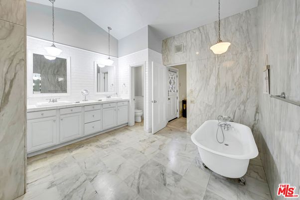Bathroom, Dual Sink Vanities, Free Standing Baths, Interior, Marble, Marble Walls, Pendant Lights