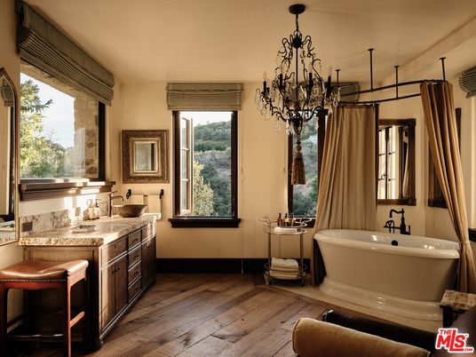 Bathroom, Chandelier, Dual Sink Vanities, Free Standing Baths, Interior, Wood Texture Flooring