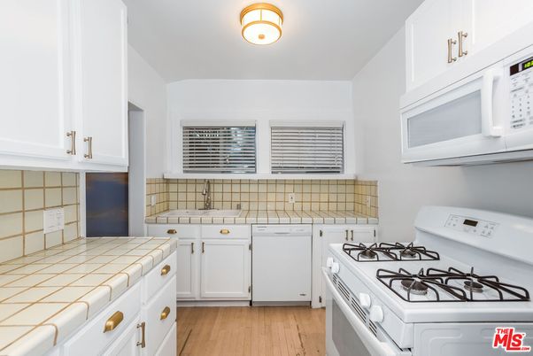 Interior, Kitchen, Tile Countertops, Wood Texture Flooring