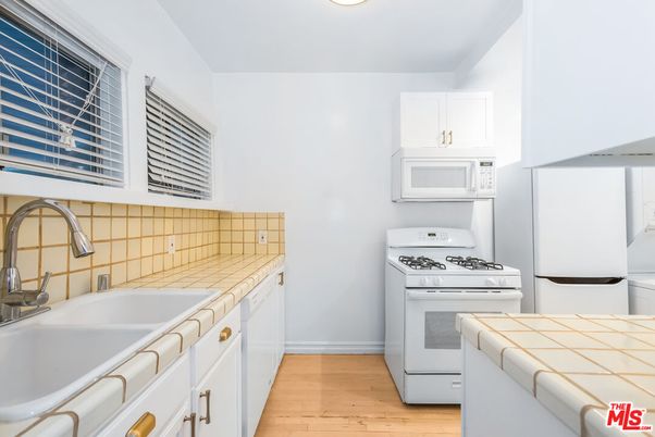 Interior, Kitchen, Tile Countertops, Wood Texture Flooring
